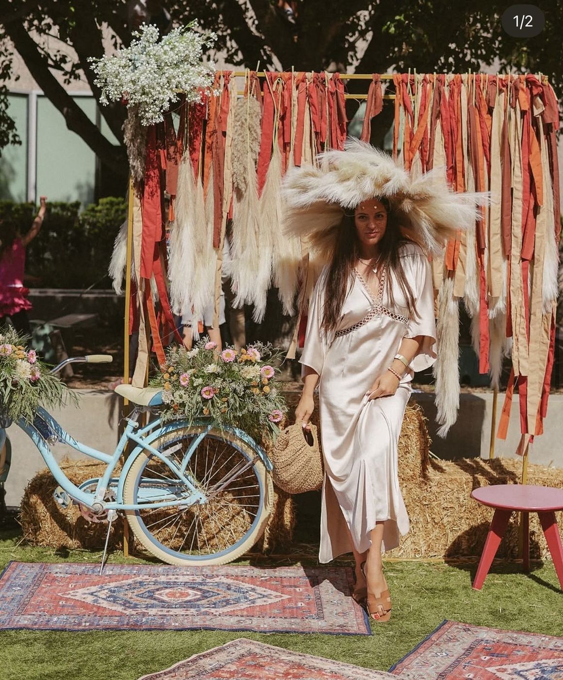 Boho birthday photo backdrop with vintage bicycle