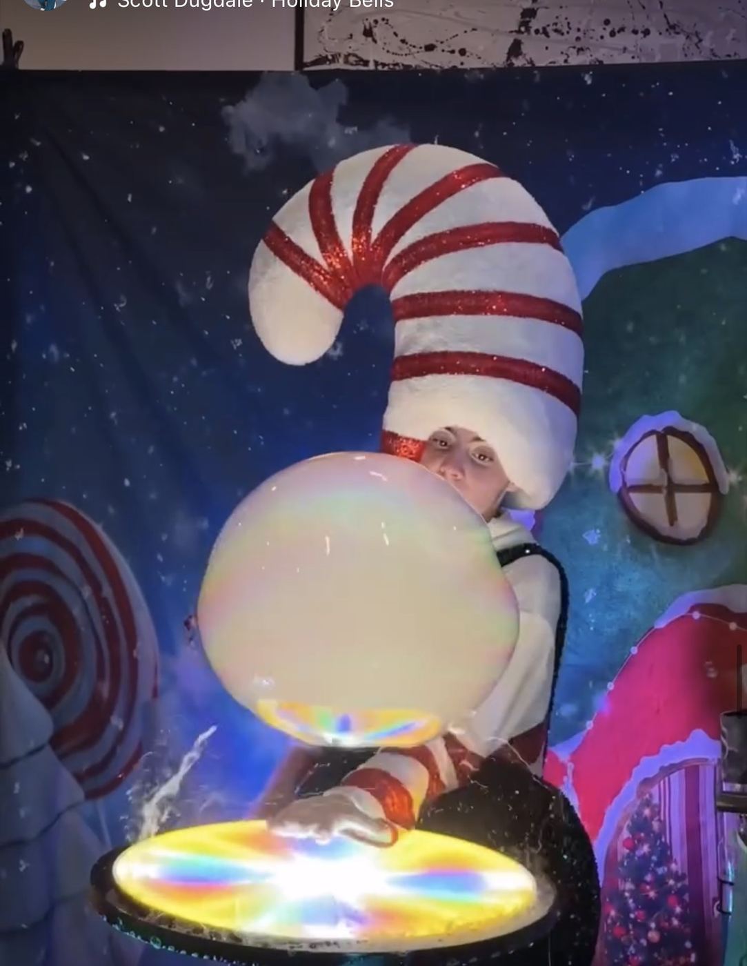 Candy cane themed bubble show performance